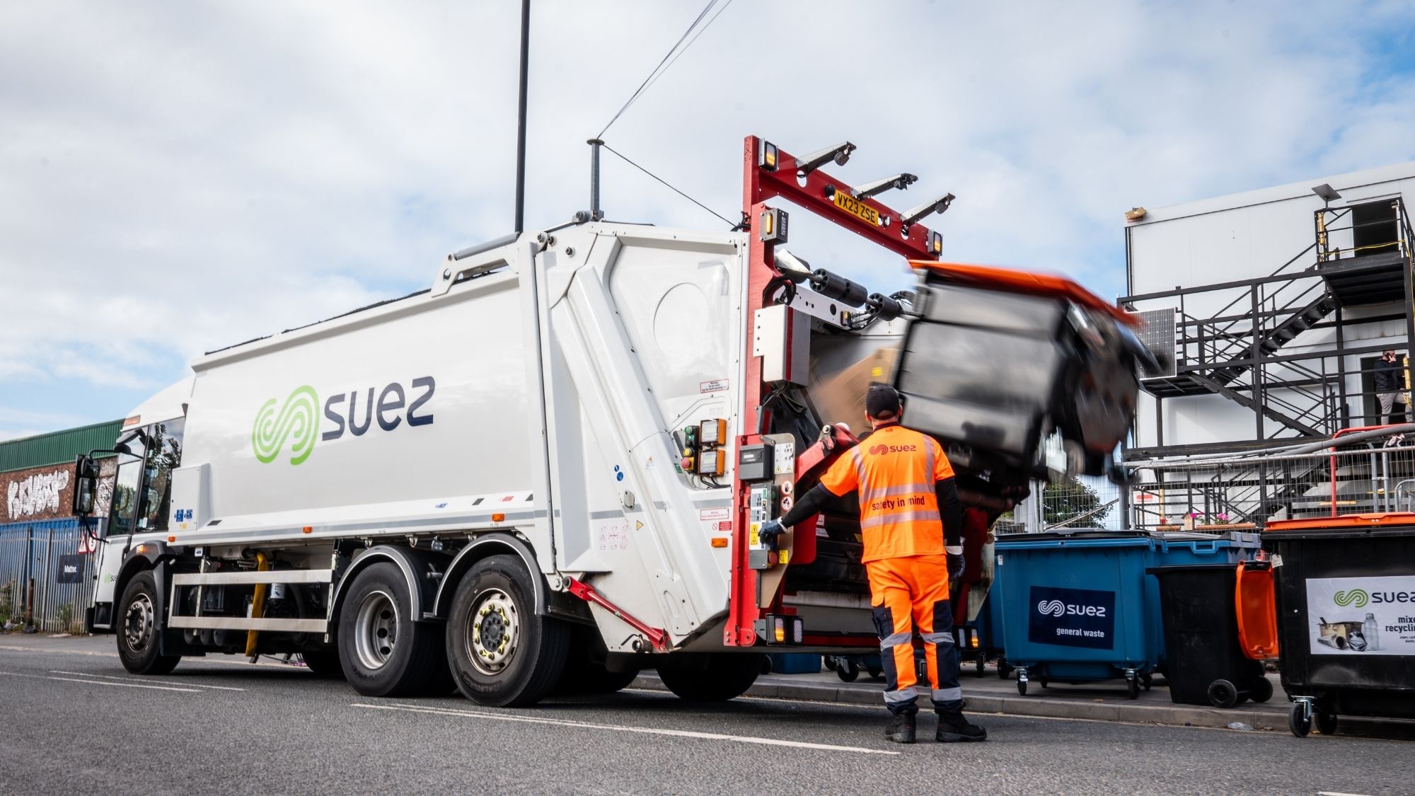 SUEZ commercial waste collection in town centre - general waste and recycling