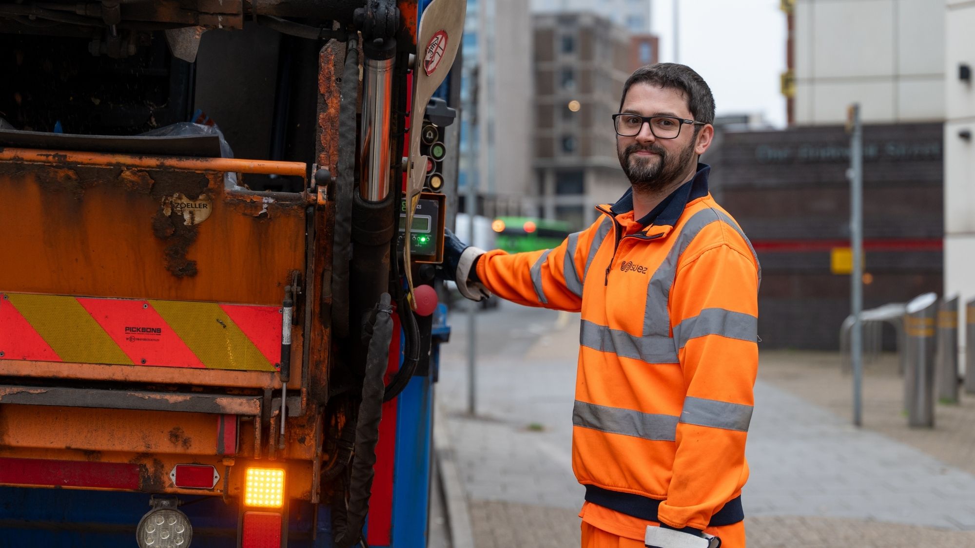 SUEZ collection worker