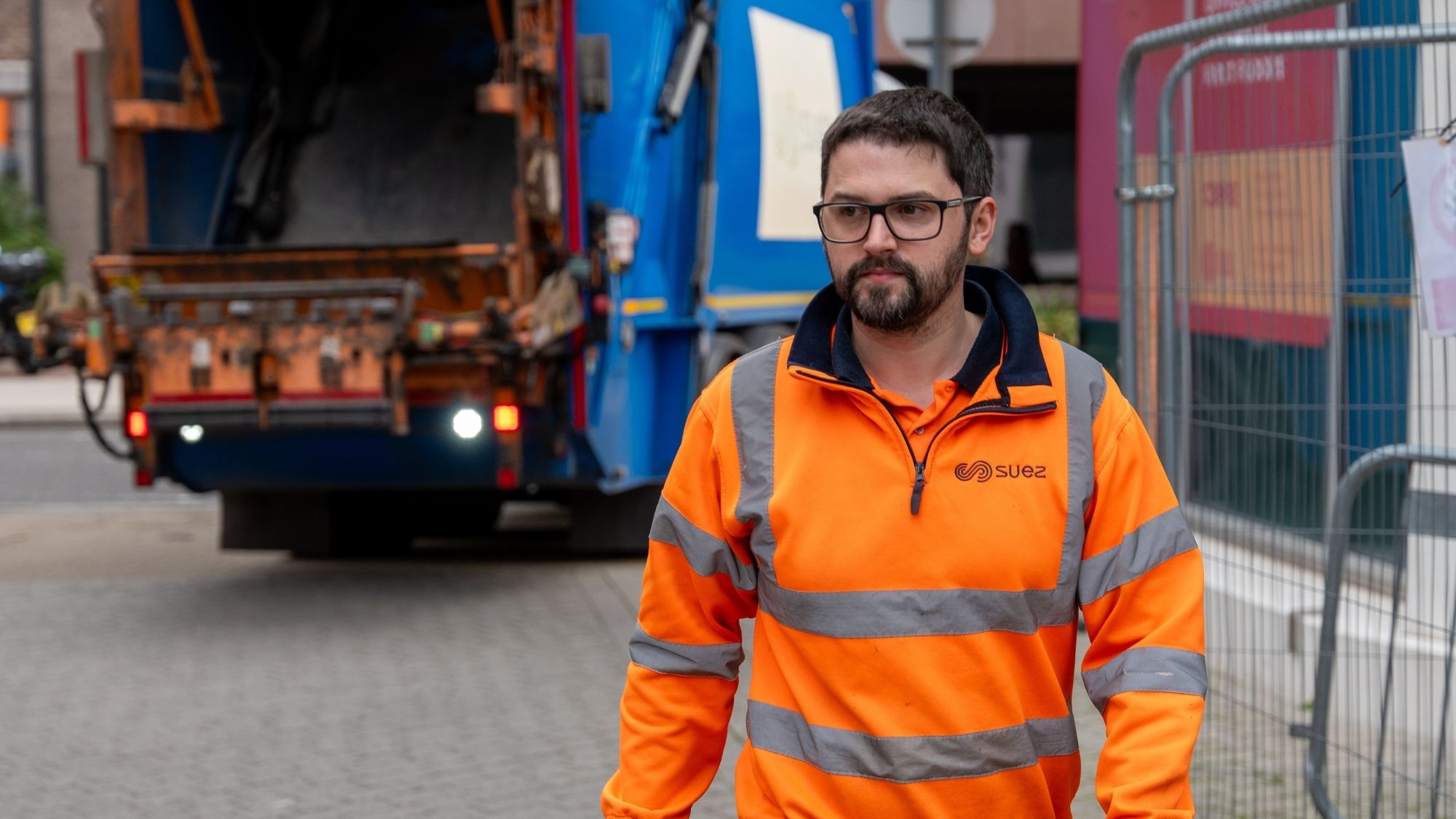 SUEZ waste collection worker