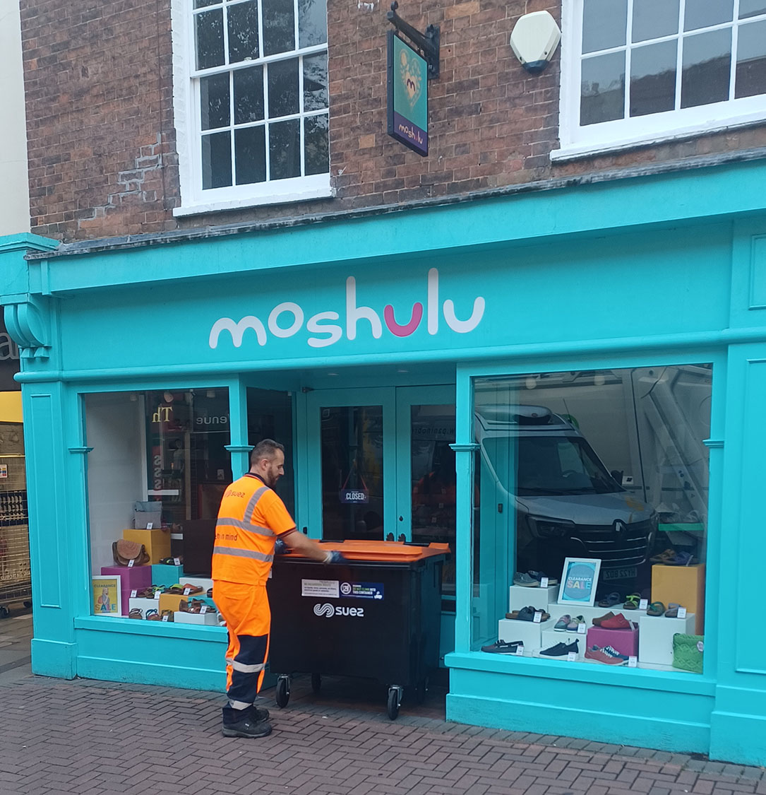 Picking up recycling materials at a Moshulu store