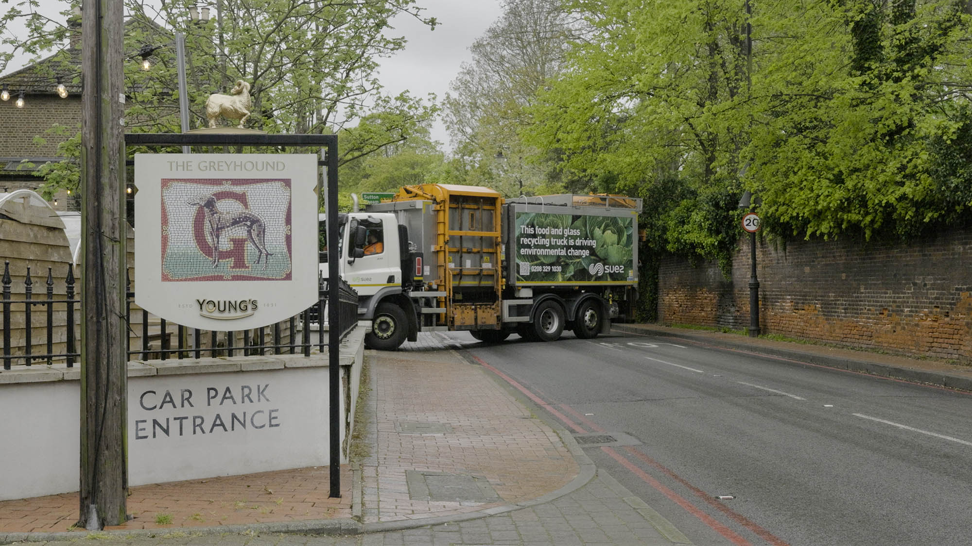SUEZ truck collecting from Youngs pub
