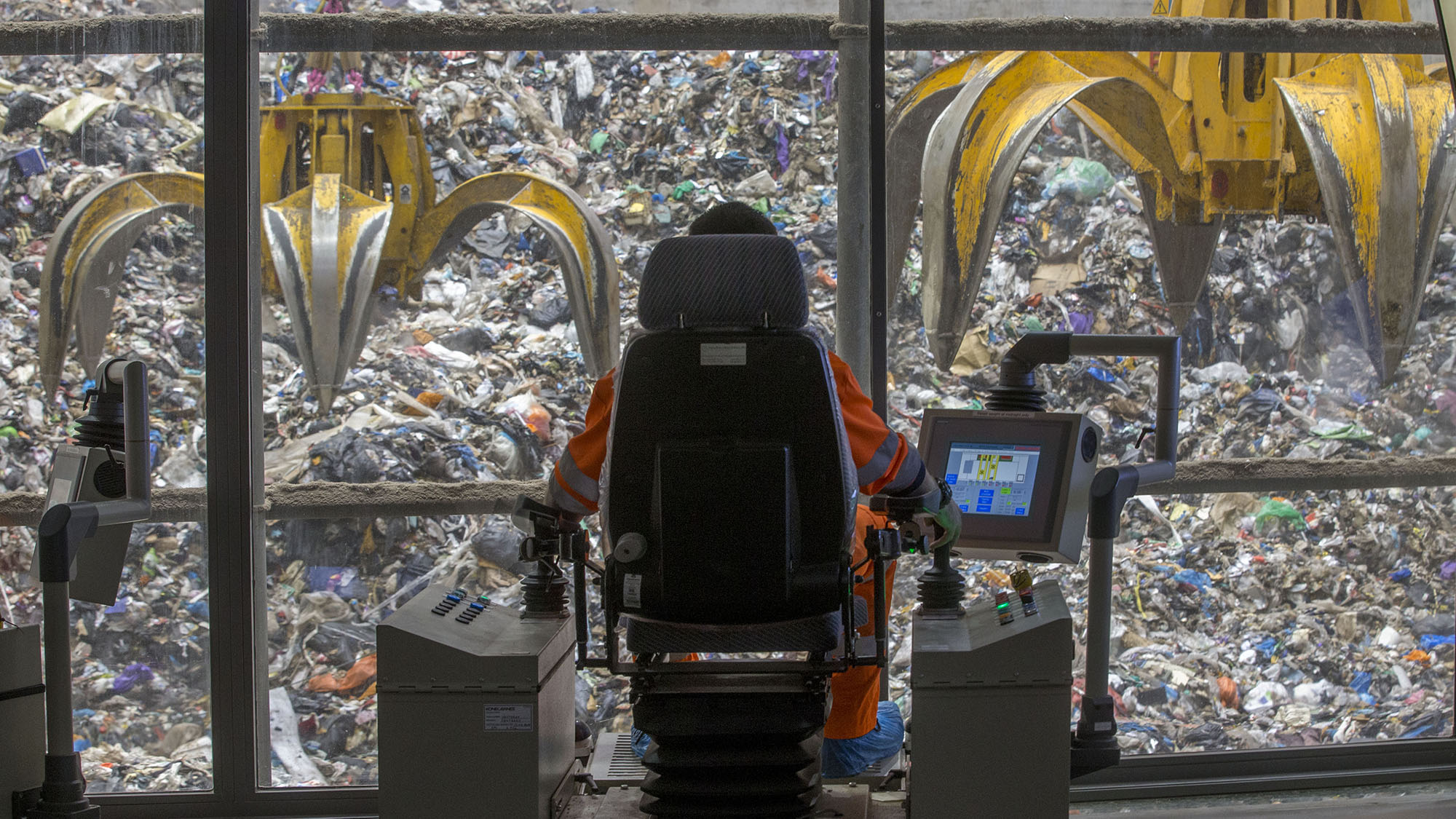 Employee operating the grab