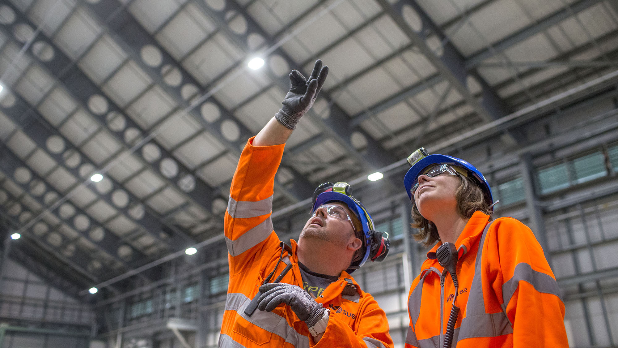 Employees looking up inside energy-from-waste facility