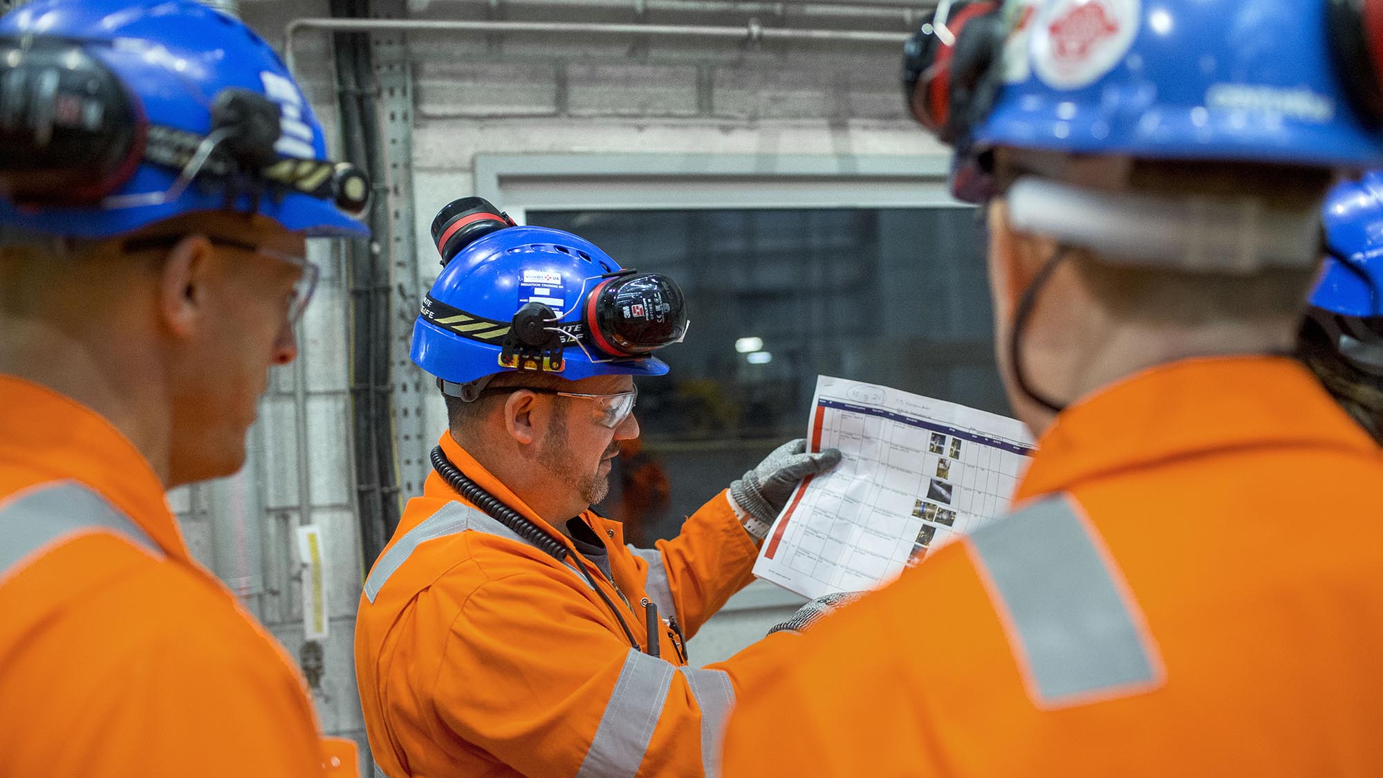 SUEZ employees at an energy-from-waste facility having a briefing