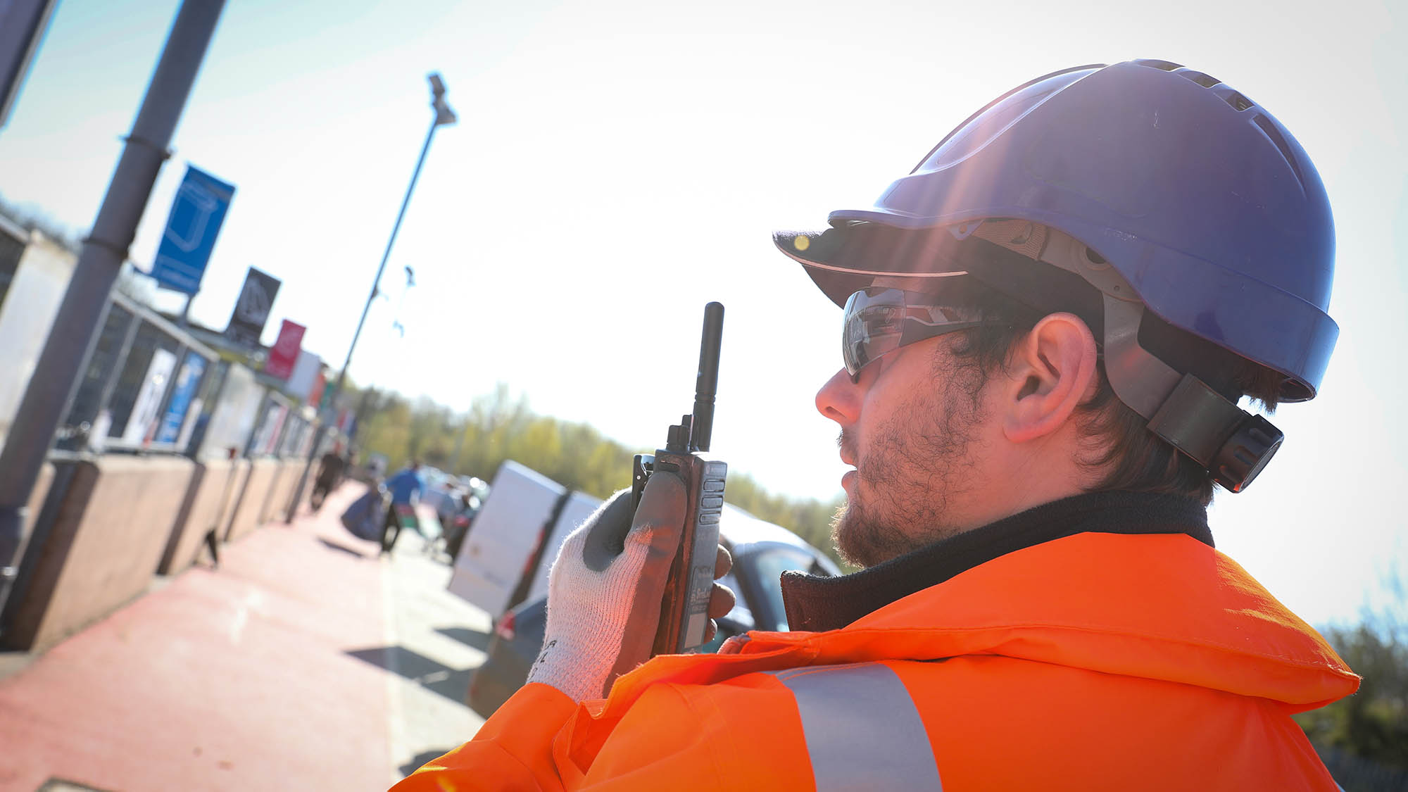 Bredbury HWRC employee on a radio