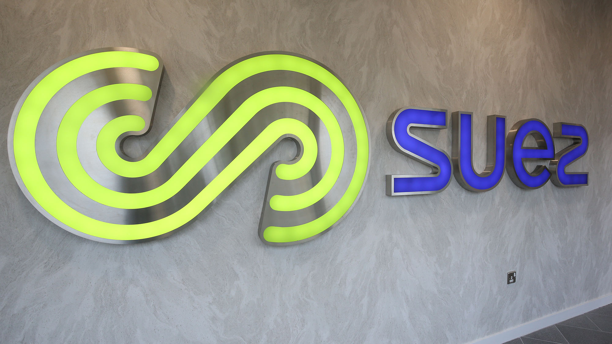 SUEZ House illuminated sign