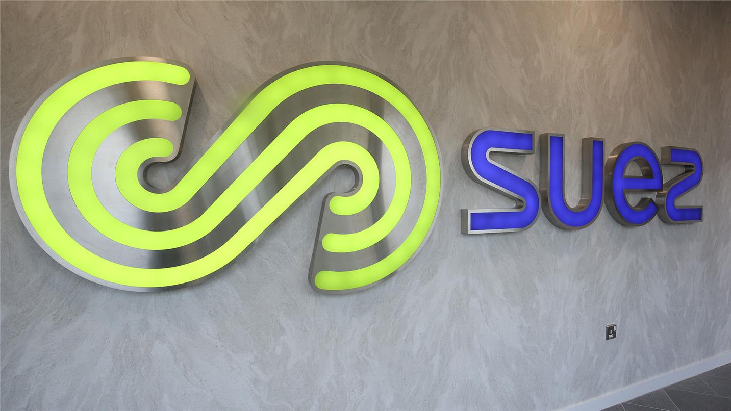SUEZ House illuminated sign