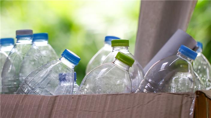 Plastic bottles in a cardboard box