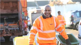SUEZ employee on a municipal collection round