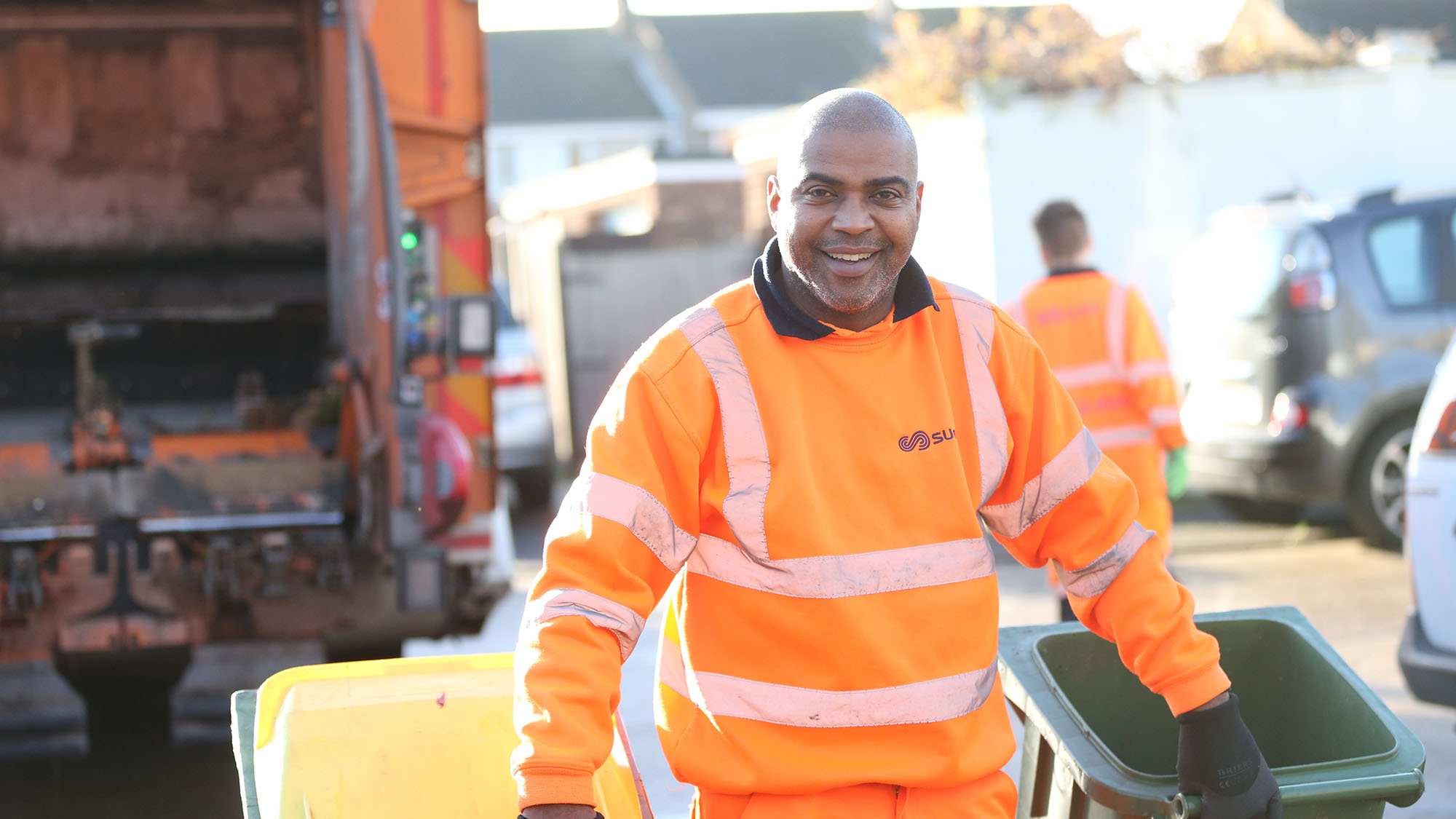 SUEZ employee on a municipal collection round