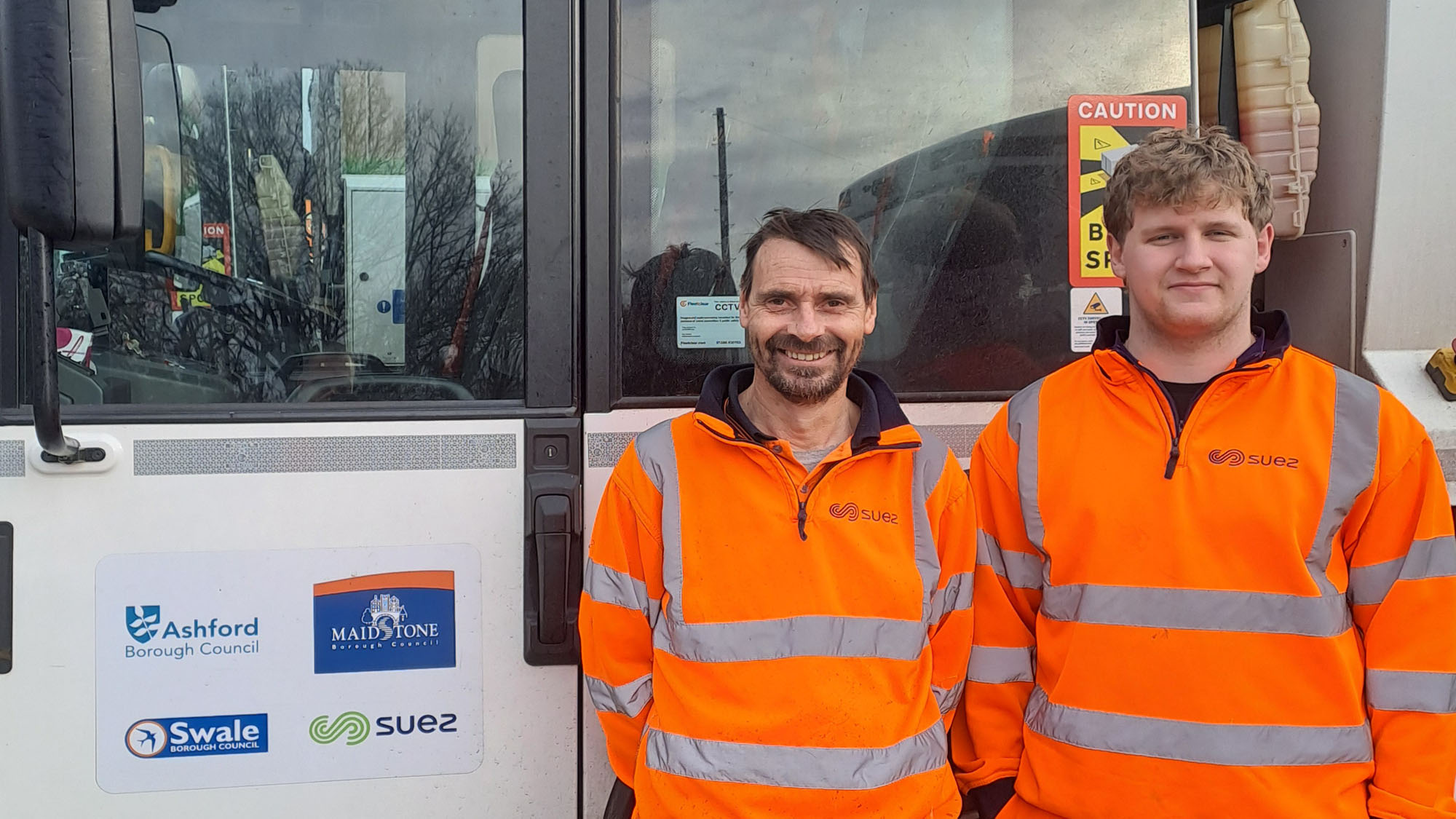 SUEZ staff after helping an person in distress