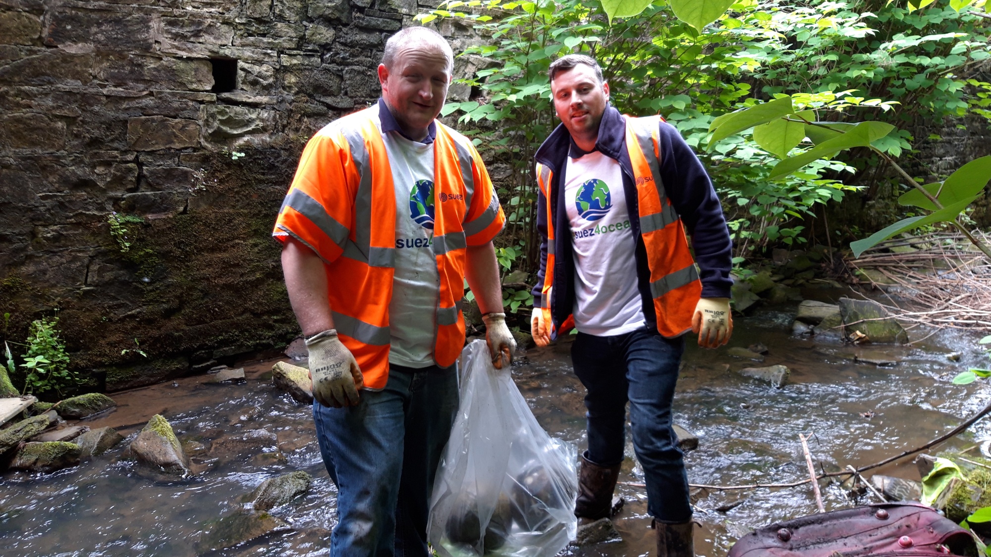Litter picking in the River Darwen