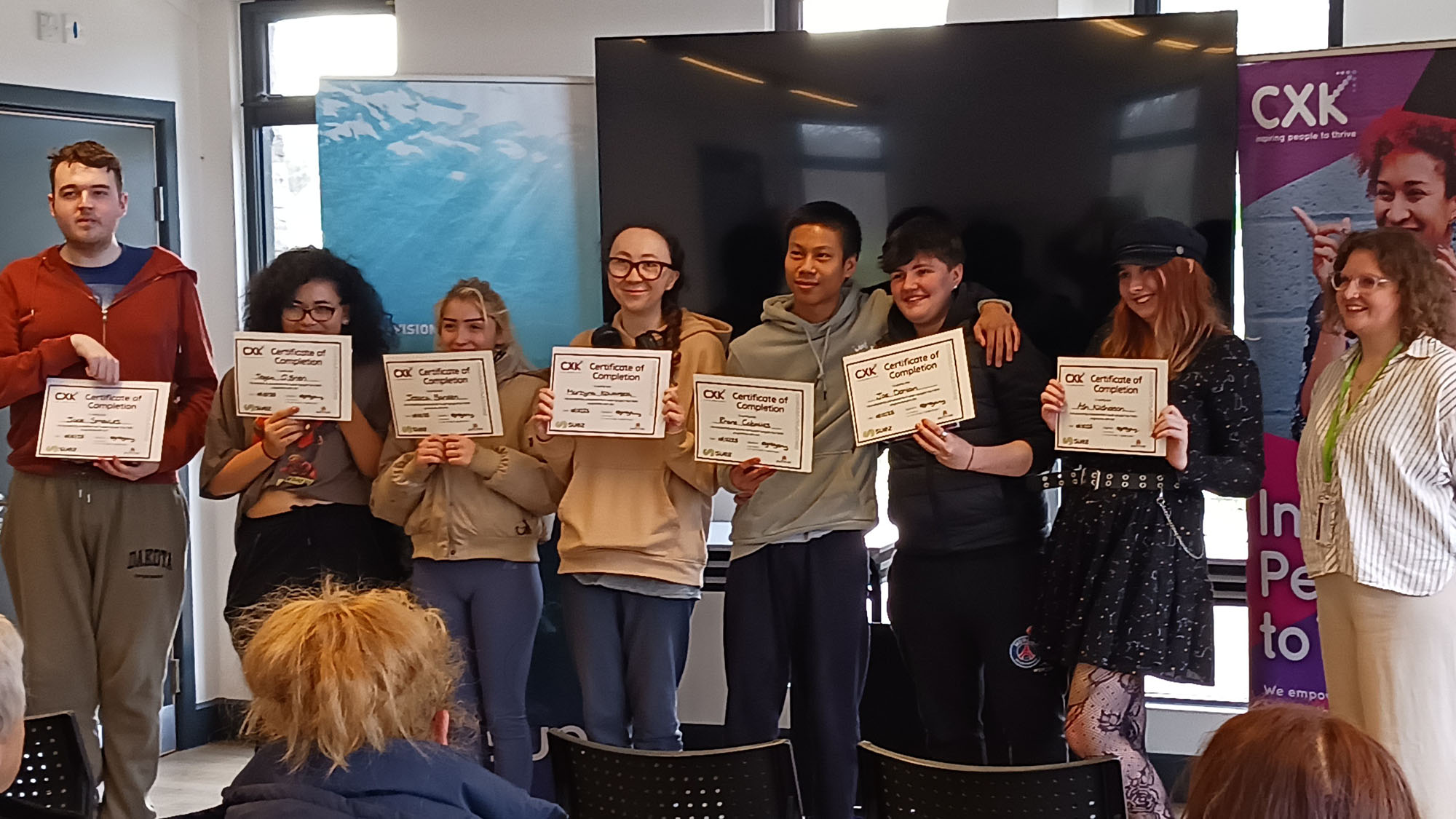 Young adults in Maidstone with their Up Skilling certificates