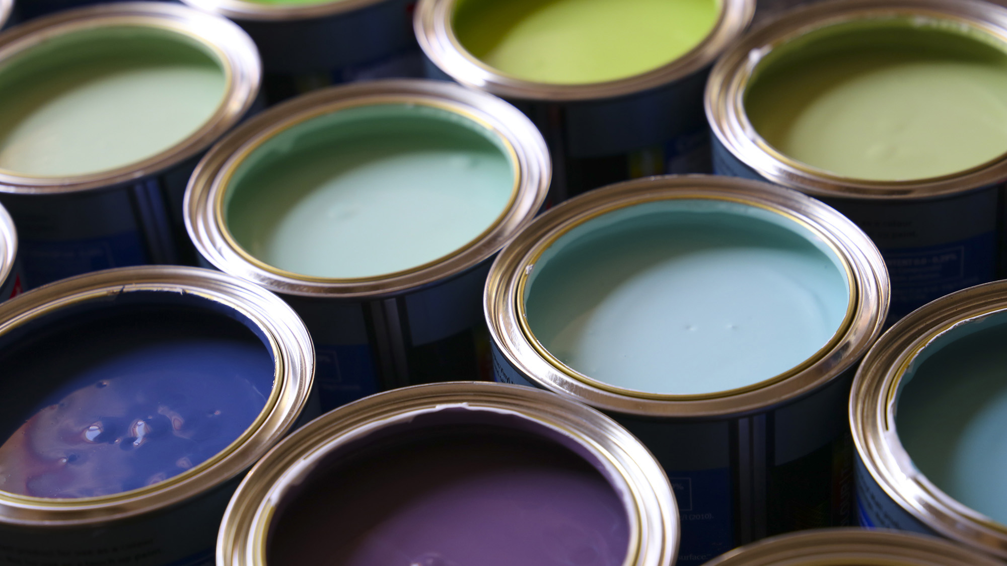 Tins of different coloured paint