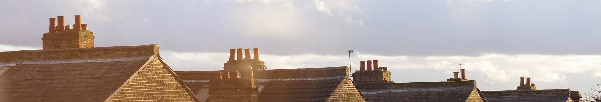 A row of terraced house rooftops