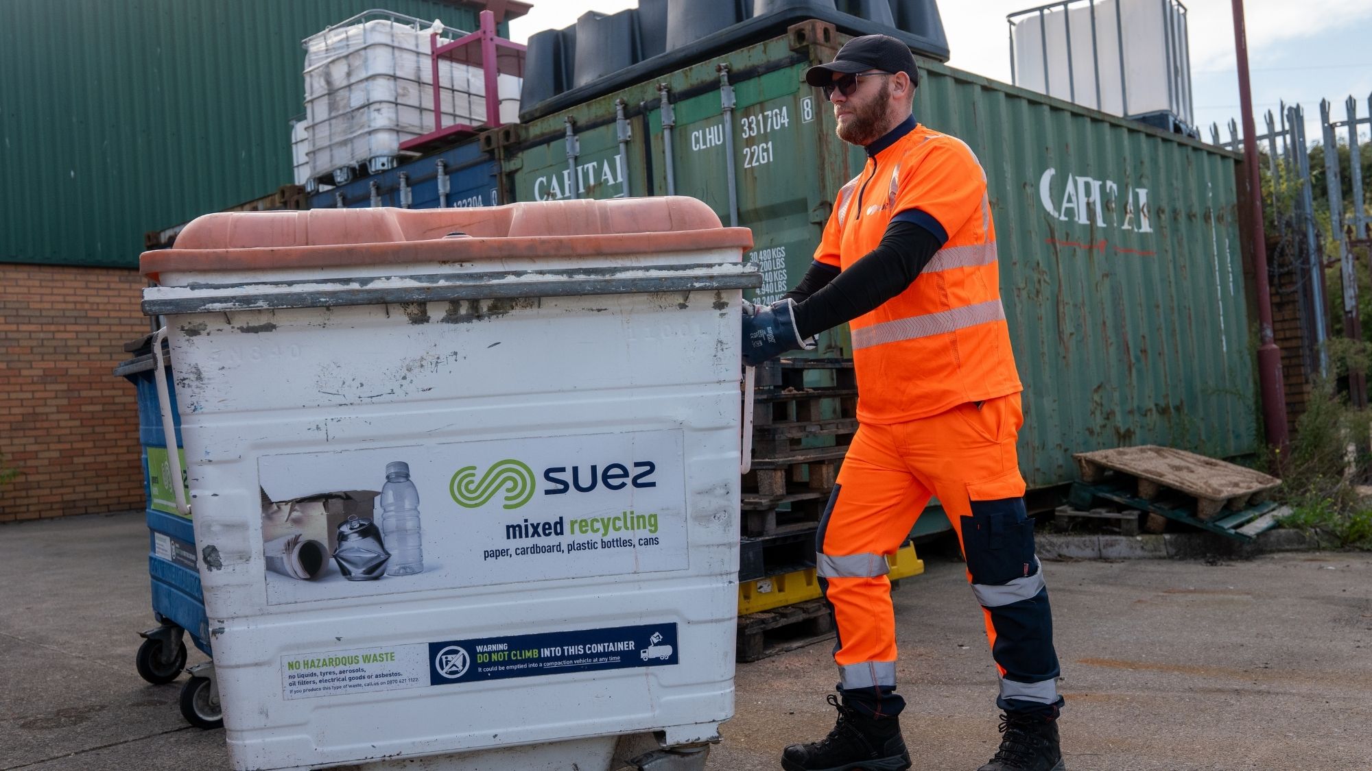 SUEZ waste worker