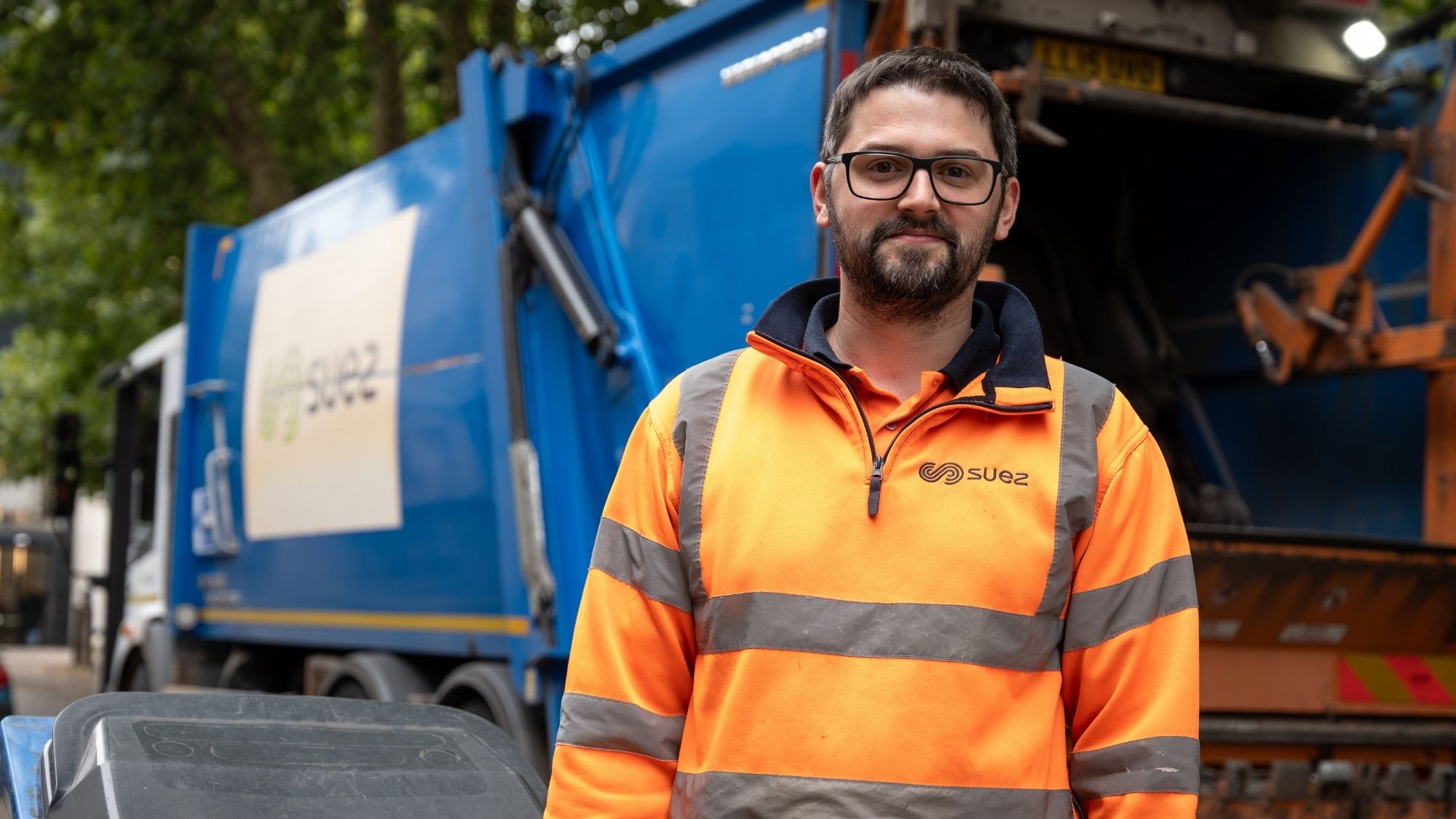 SUEZ collection worker