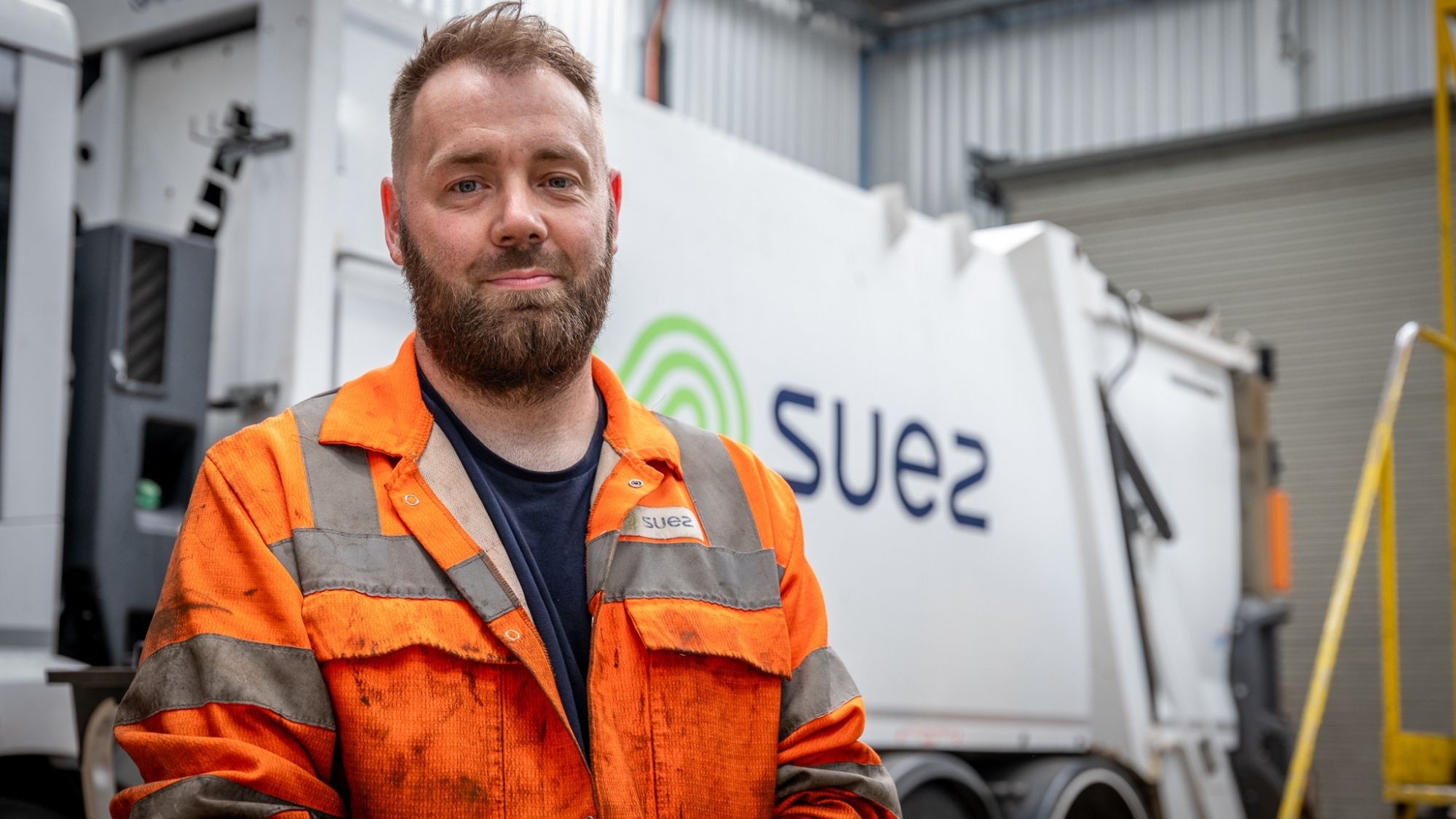 SUEZ collection worker